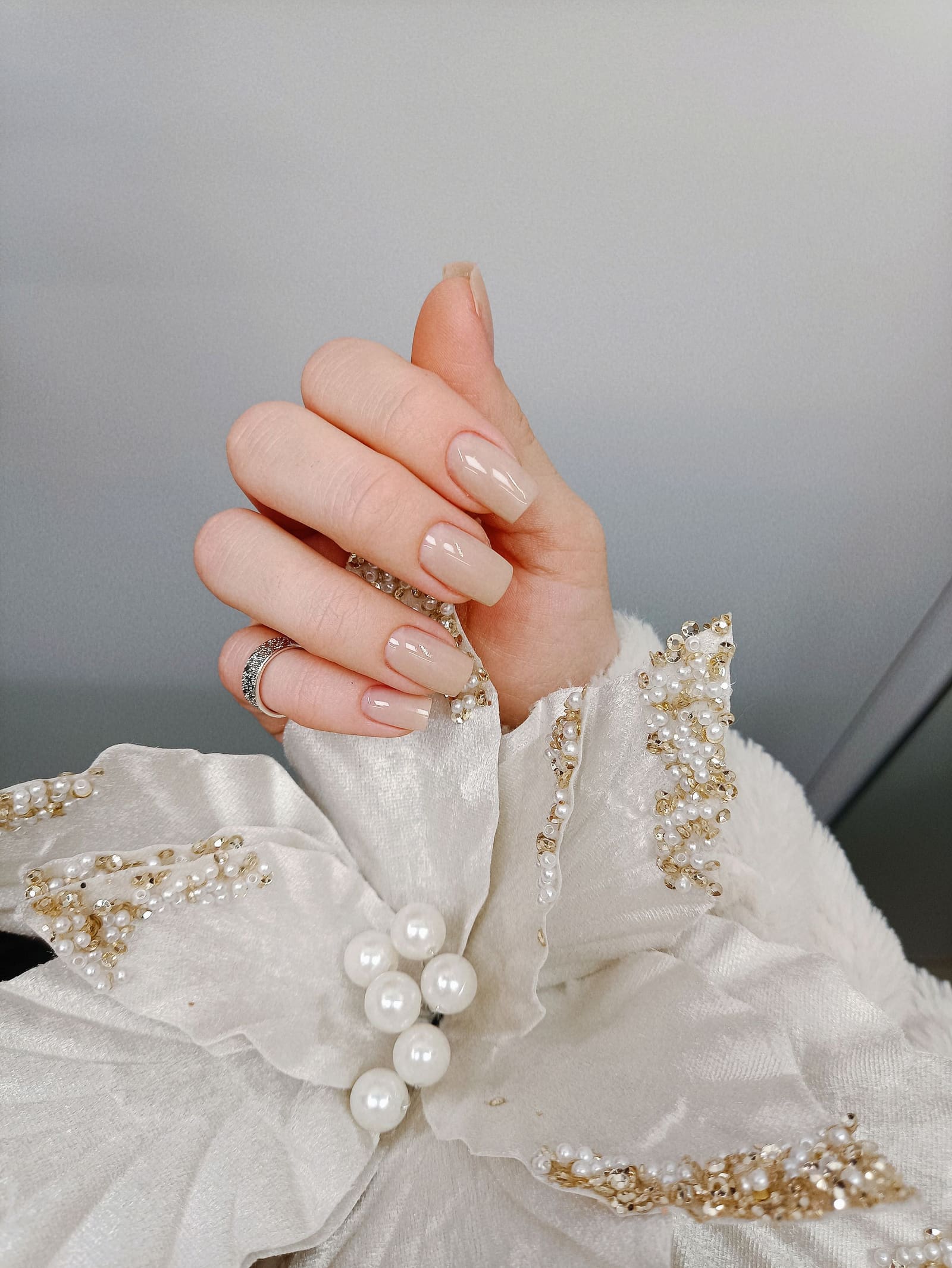 Nude square manicure with pearl details