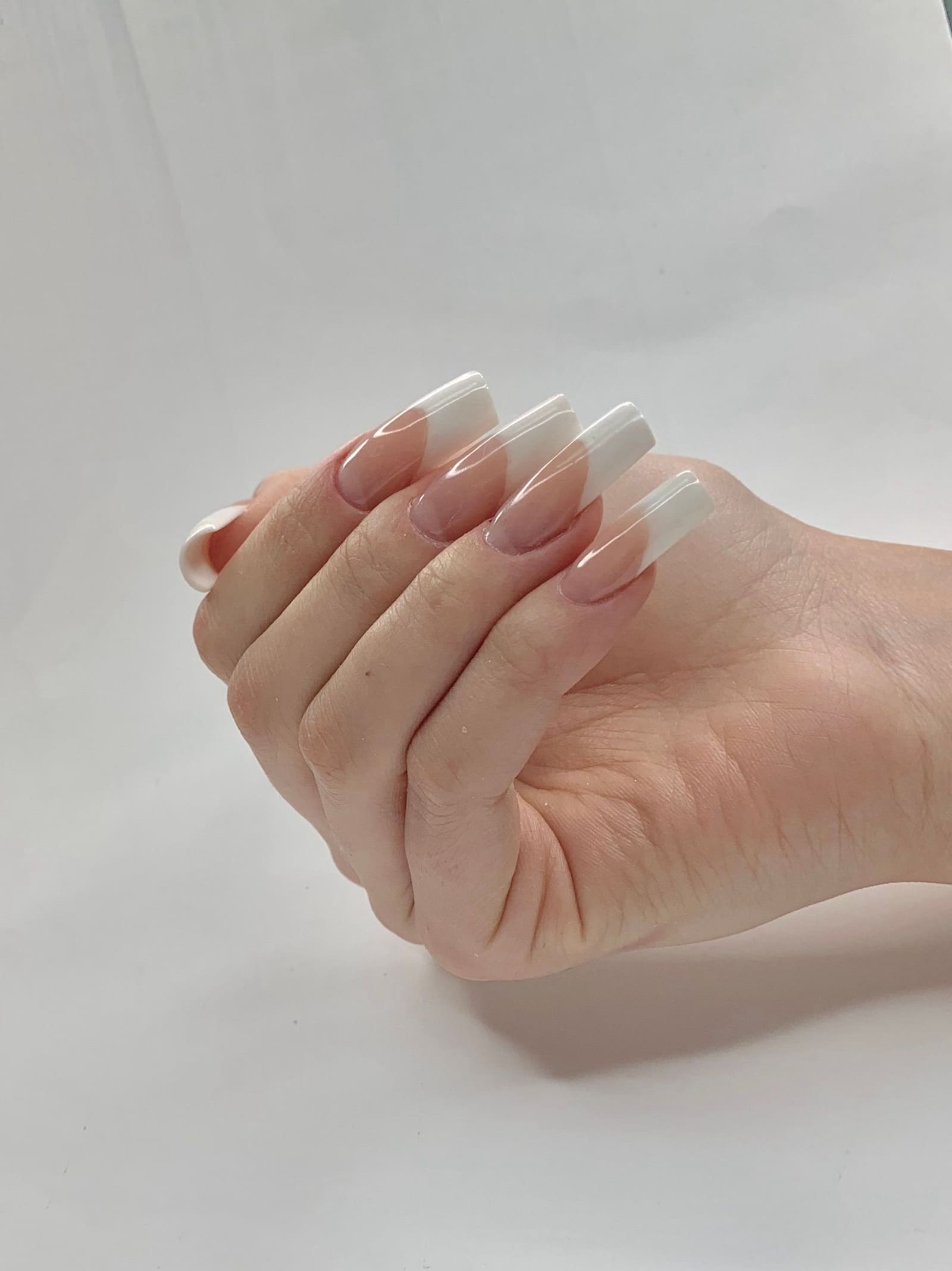 Milk french tip manicure